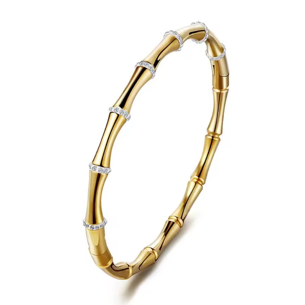 Chic Gold Bamboo-Inspired Bracelet with Crystal accents